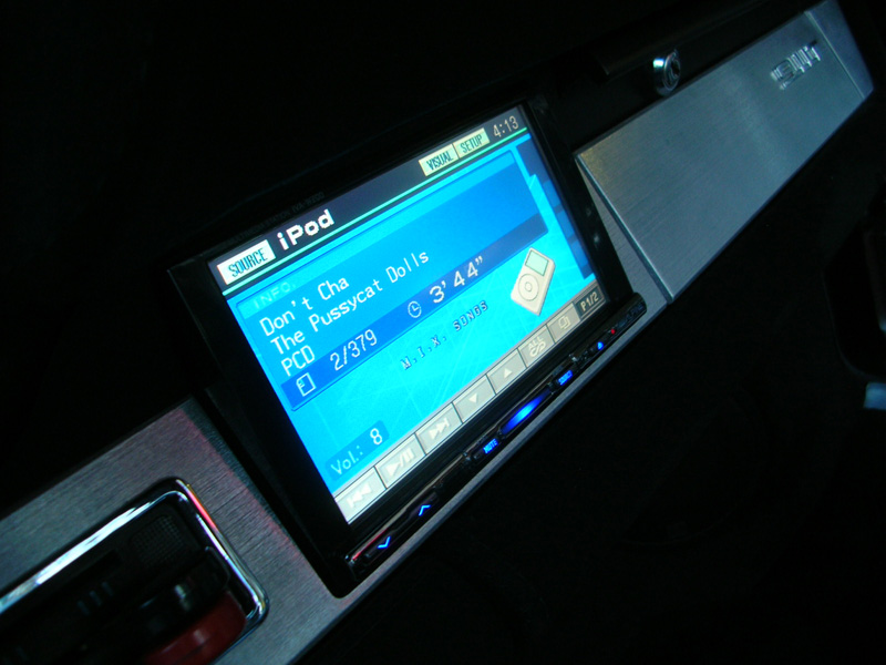 A double DIN Alpine W200 AM/FM DVD radio was chosen for its excellent iPod and XM radio interface, its ease of operation and cool looks.