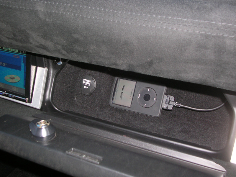 The inside was flocked with black suede and the iPod now resides here.