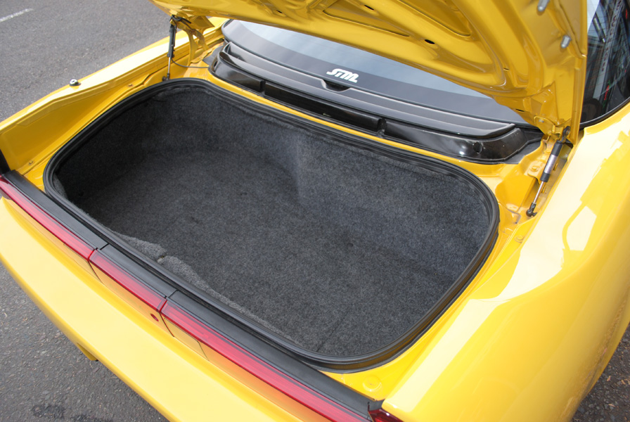 The trim piece helps keep the carpet level when folded down.