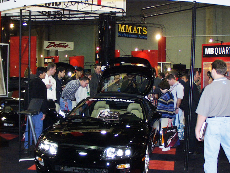Even today this car (and the system) still draws a crowd. This picture was taken at the 2000 Consumer Electronics Show (CES) in Las Vegas, while on display in the MB Quart booth. MB Quart had sponsored the Q-series and Reference-series speakers used in the install. We also would like to thank Phoenix Gold, Fujitsu Ten (Eclipse) and JL Audio for their sponsorship and support.