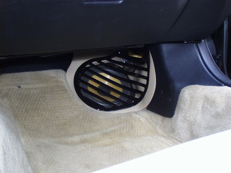 A Focal 4" midrange and T45 tweeter from the same Polykevlar line was used to reproduce the upper octaves. An ABS enclosure was constructed in the fender well inches behind the front tire. The speaker then fires into the listening area with minimal path length differences. The tweeter is suspended just in front of it on a custom mount.