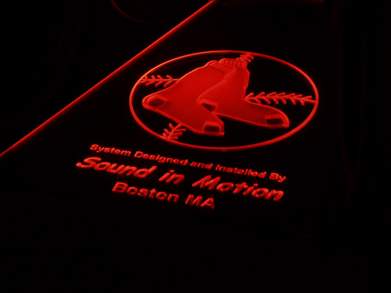 The bottom of the "Bass Chamber" features a Boston Red Sox logo and Sound in Motion credits. This was milled out of 1/2" plexiglas and side-lit with red neon for this cool effect.