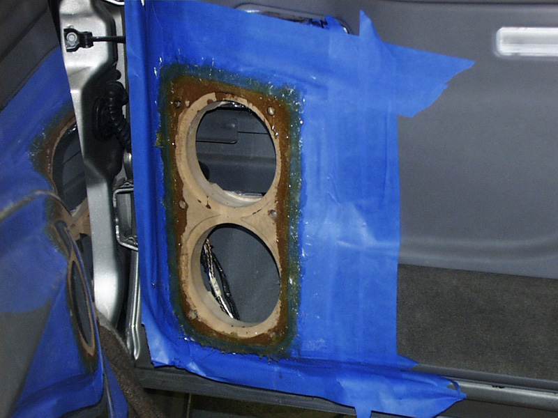 The factory door panels were cut and custom speaker mounts were made out of MDF and fiberglass.