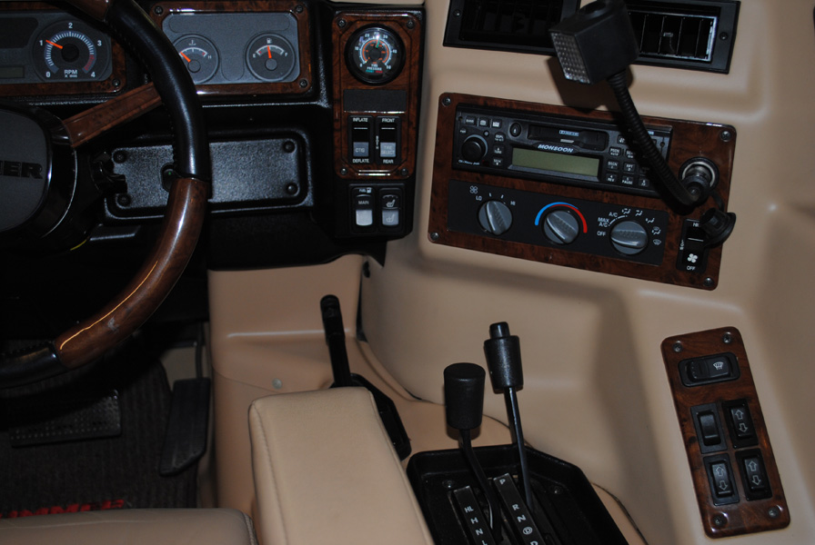 Take note of the original single DIN Monsoon radio and the climate control below it.