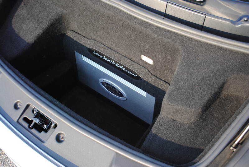 A Genesis Profile Four Ultra Amplifier was chosen to supply the power for the sound system. It's low profile allowed us to flush mount it under the hood.