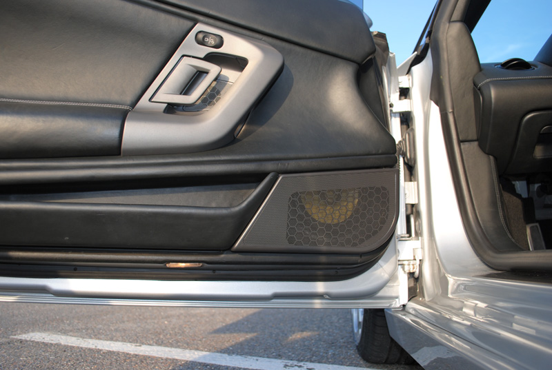 We chose a pair of Focal 6.5" K2P Co-axial speakers in the factory location, primarily because of the good sound stage they produce without having to cut holes for separate tweeters. With the low seating position in this car it worked out great.