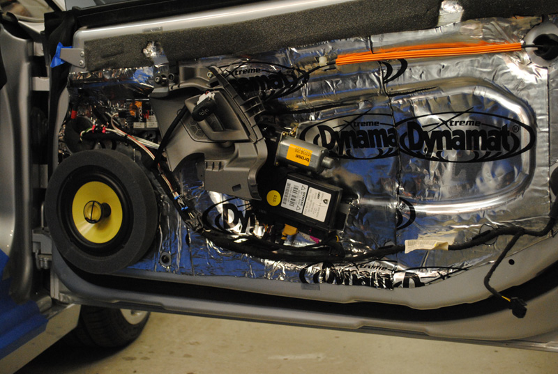 A mandatory dose of Dynamat sound deadening was applied to the doors. Also notice the thick foam-rubber gasket Sound in Motion uses to seal the speaker against the door panel.