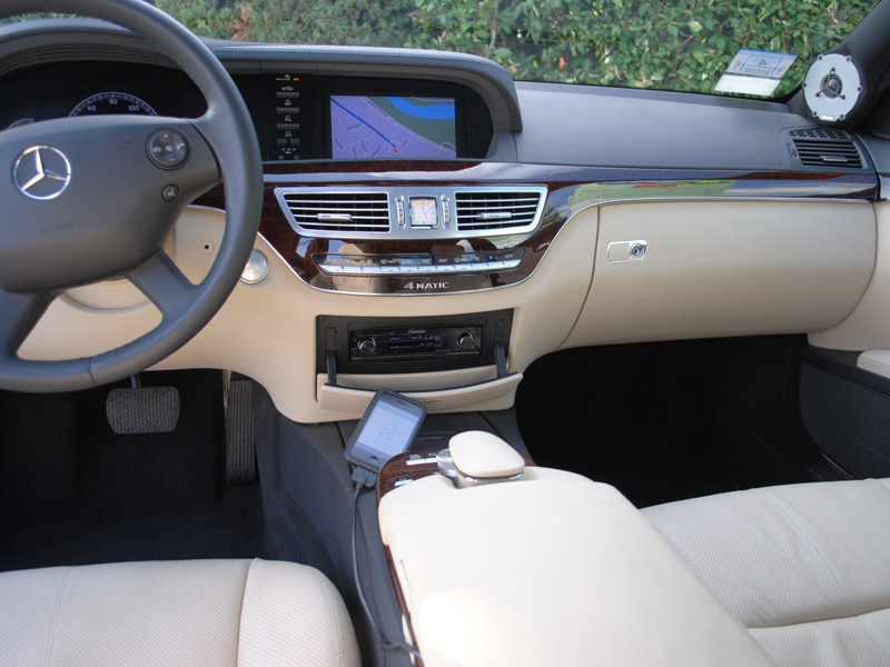 The clean interior of this vehicle with its integrated sound, phone and navigation system does not lend itself for an aftermarket radio. But if you look closely in the lower dash, there is one.