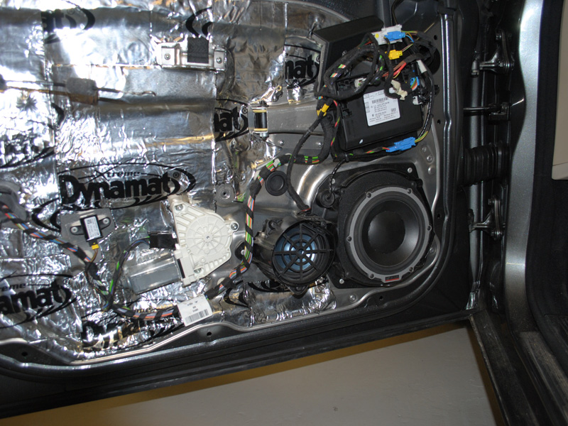 The front doors were treated with Dynamat Sound deadening on the inner and outer skin. And the 6" Dynaudio midrange / woofer was mounted in the factory location with a custom mounting ring. The smaller OEM midrange was retained for the factory phone and Nav voice.
