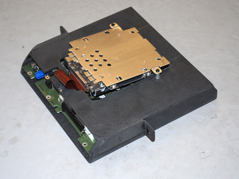 An ABS box was constructed to house the necessary components while still utilizing the suspension for the Nav hard drive. This unit mounts below the Pioneer radio and is serviceable.