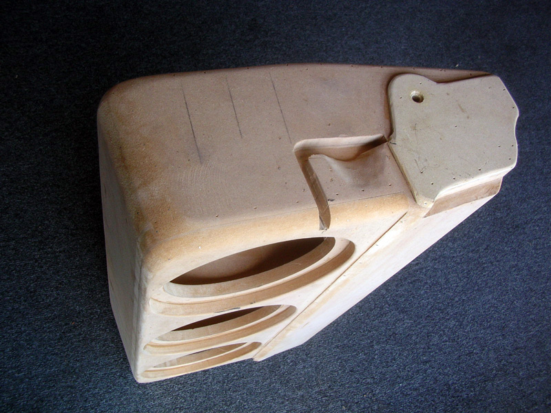 The new rear seat/subwoofer box. Many pieces of precisely shaped MDF went into making this enclosure so it has the shape of the original seat and also the correct air volume for the JL Audio subwoofers.