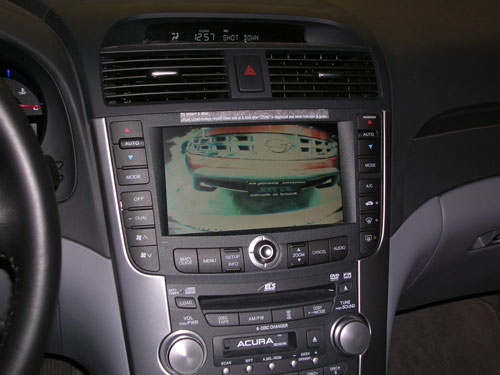 2005 Acura TL  - An outboard RGB converter was used to get the Image from the Back-Up Camera onto the factory navigation screen when placed in to reverse.