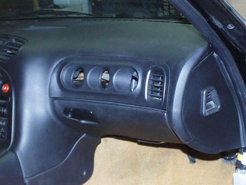 1993 Mazda RX7 - Similar gauge cluster molded into the passenger side dash. Again, all made out of plastic. Note: this car did not have an airbag here.