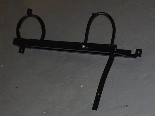 2002 GMC Yukon - A rack was welded out of 1/8" steel with a lockable safety latch to hold an air bottle for air-suspension set up.