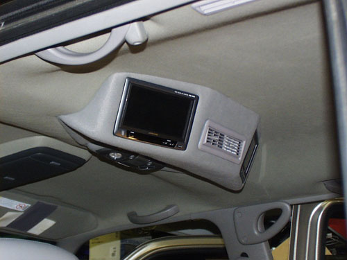 2000 Chevrolet Suburban - An overhead console was constructed out of 3/16" ABS plastic to house two Alpine monitors, the dome light and the factory rear vent.