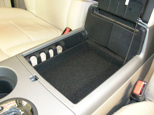 2004 Ford F150 - The original center console in this pick-up is so big that everything got lost. Per customer request we fabricated a hinged insert out of plastic to help organize things.