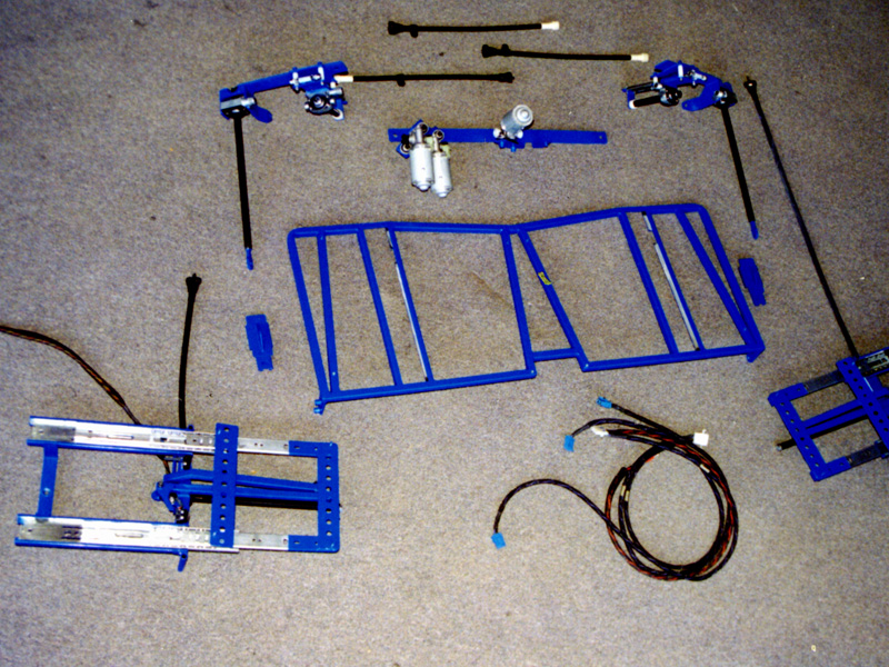 1994 Toyota Supra Twin Turbo - This is part of the most efficient and reliable motorization we have ever done. All steel construction with ball bearing tracks and limit switches. Worm drives (similar to those used for power seats and old convertible tops) capable of pushing 300+ lbs where used to move up and swing out an amp rack as well as signal processors in our Supra.
