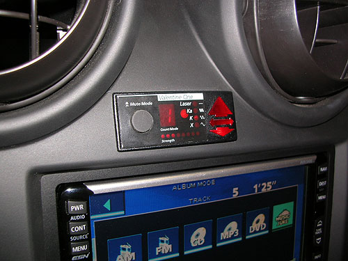 2005 Hummer H2 - The remote display for a Valentine One was carefully flushed into the dash of this Hummer. This allows you to mute it without having to raise your hand to the windshield.